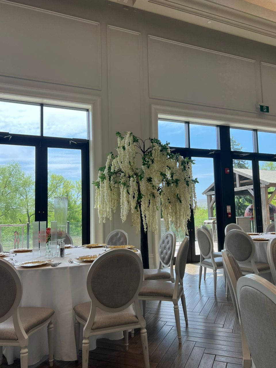 Grand artificial wisteria tree adding height and elegance to a Mississauga event