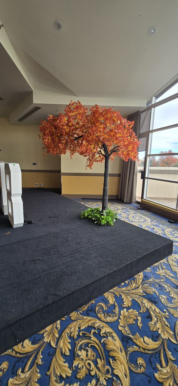 Artificial maple arch tree rental adding ambiance at Lionhead Golf and Conference Center.