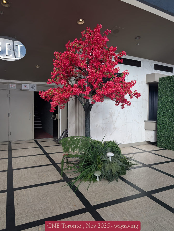 Artificial bougainvillea tree set up near an entrance at an indoor ceremony in Mississauga.