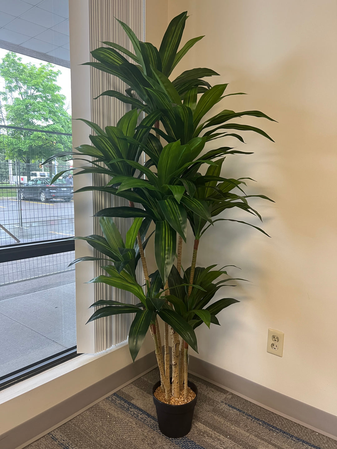 Artificial yucca plant trunk detail showing sturdy structure and natural proportions.