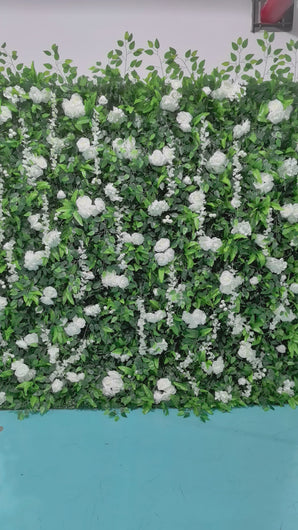 Artificial floral wall featuring white roses and orchids with lush greenery, ideal for wedding backdrops, photo booths, and event decor. What are the dimensions of this flower wall? Is it weather-resistant for outdoor use? How realistic do the flowers look in photos and up close?