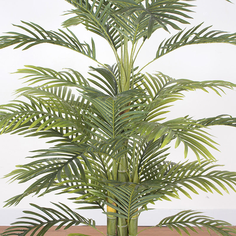 Realistic artificial palm tree with lush green fronds, perfect for indoor and outdoor decoration, adding a tropical touch to any space