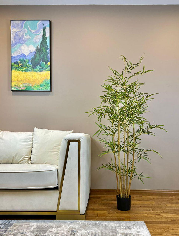 Elegant artificial bamboo plant in a black pot, perfect for adding a natural touch to any indoor decor.