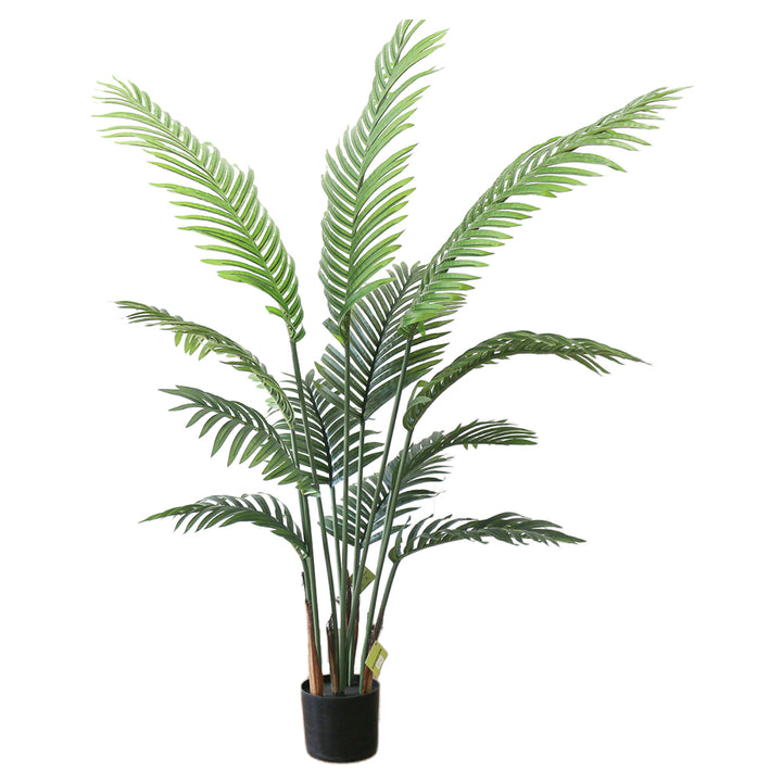 Artificial palm tree with green fronds adding a natural touch to a modern, well-lit living room.